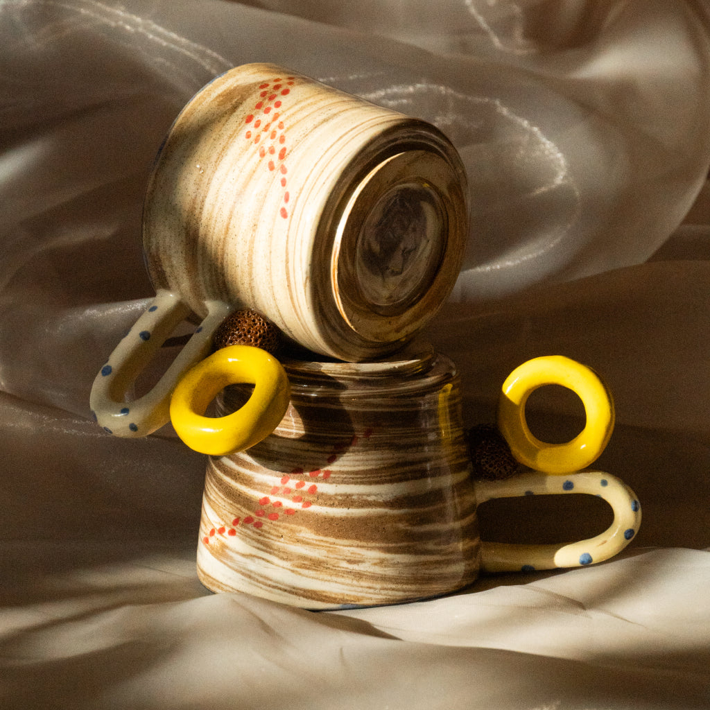 Ceramic Mug by Em Esquivel